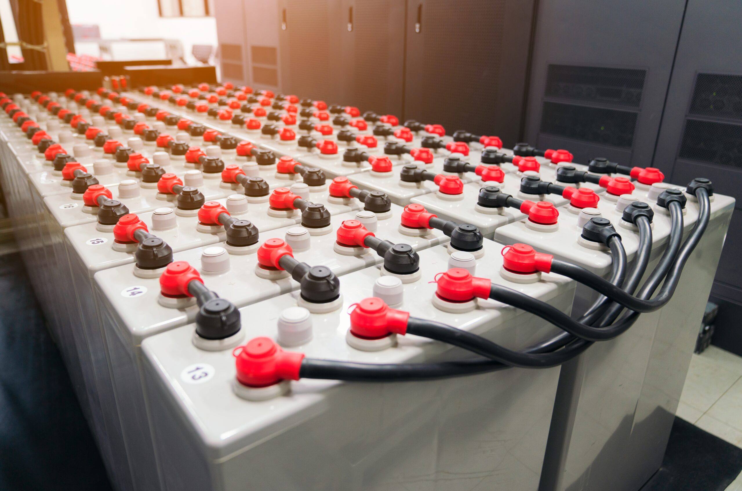Battery pack in battery room in power plant for supply electricity in plant during shutdown phase, Rows of batteries in industrial backup power system.